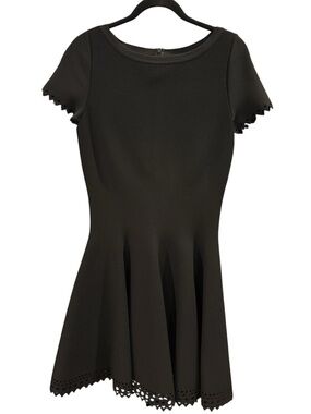 Alaïa Black Editions Laser-Cut Knit Mini Dress